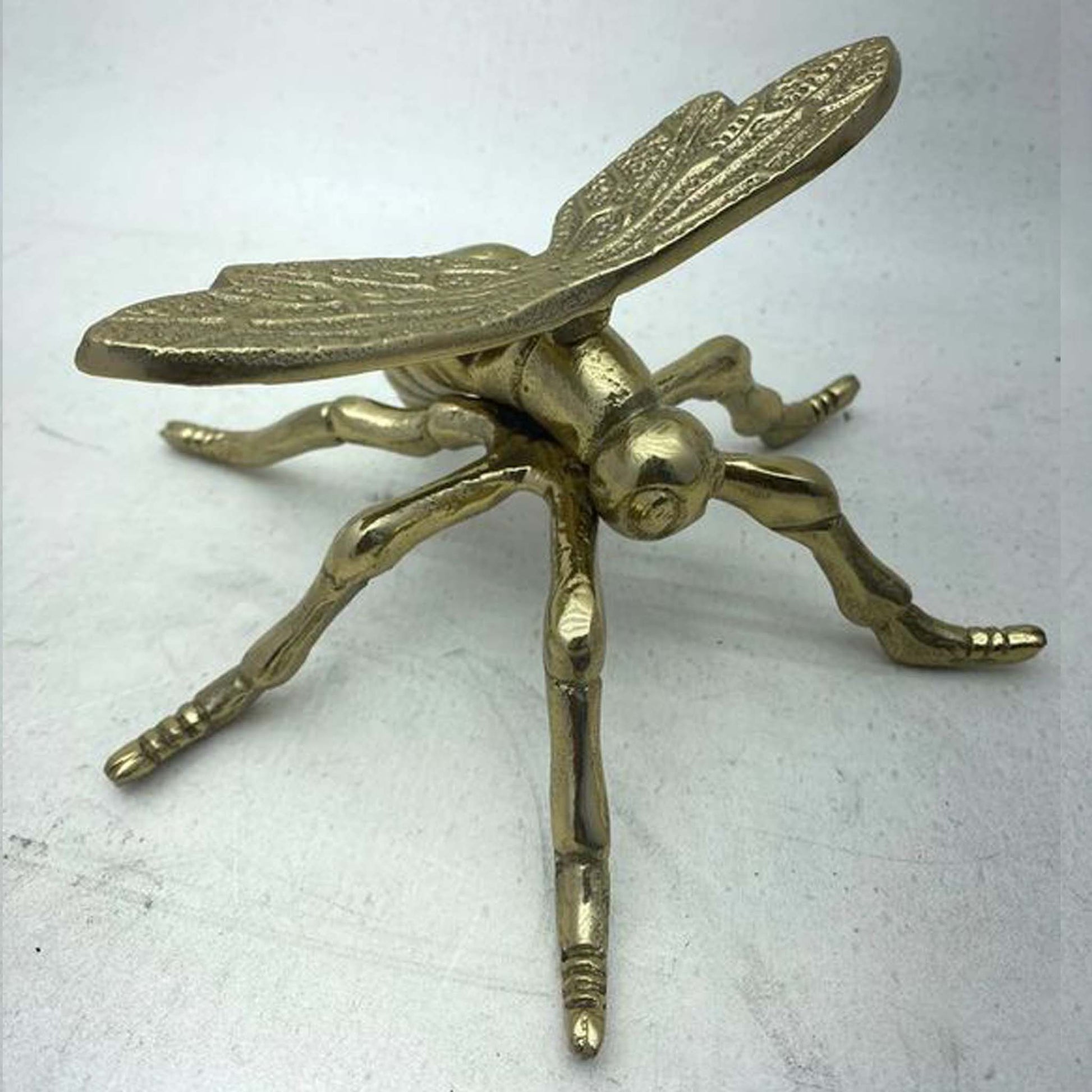 Metal dragonfly gold sculpture